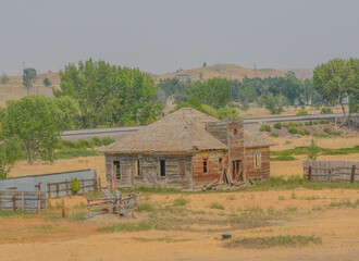 Old abandoned farmhouse in the countryside of Nashua, Valley County, Montana