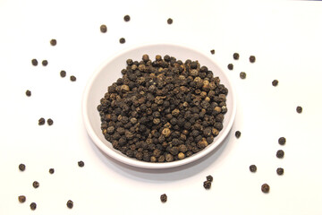 black pepper in a white bowl