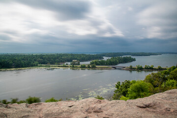 A long exposure view of Landon Bay and the St. Lawrence River in 1000 Islands National Park, Ontario on gloomy day.