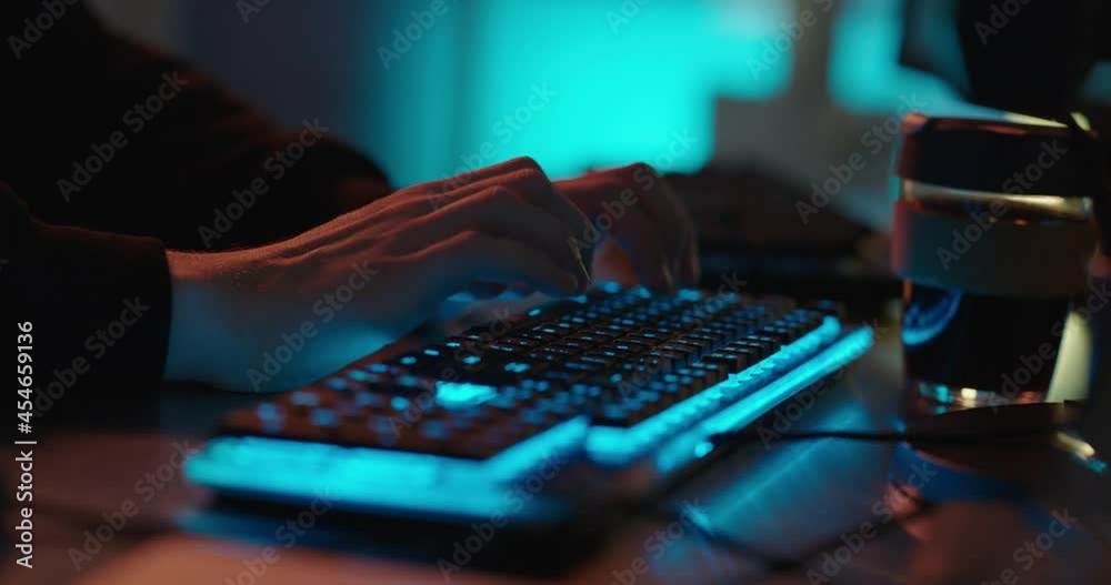 Wall mural computer hands typing on keyboard programmer coding hacking data on internet cyber crime information