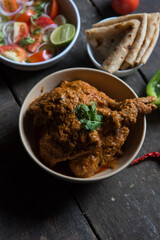 North Indian delicacy murg makhani or butter chicken prepared with chicken breast, onion, garlic...