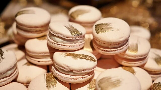 Close Up, Large Stack of Delicious Macarons With Golden Streaks At Wedding Party