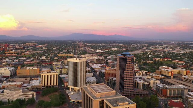 Beautiful Sunset Clouds In The Sky Over Downtown Tucson In Arizona. aerial drone orbit