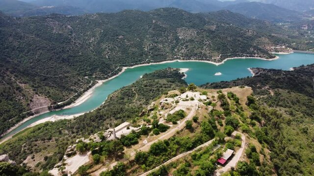 Calm Blue Waters Of Siurana Reservoir At Daytime In Tarragona, Spain. - aerial