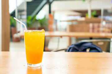 iced orange juice on wood table