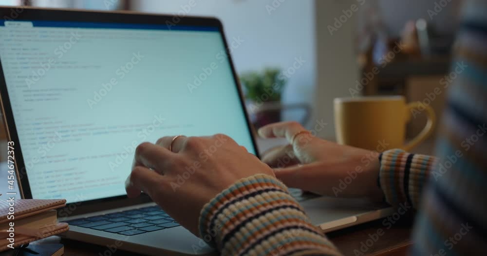 Wall mural programmer woman hands using laptop computer typing programming code software engineer student devel