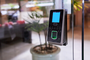 Facial recognition and fingerprints scanner machine for access door security