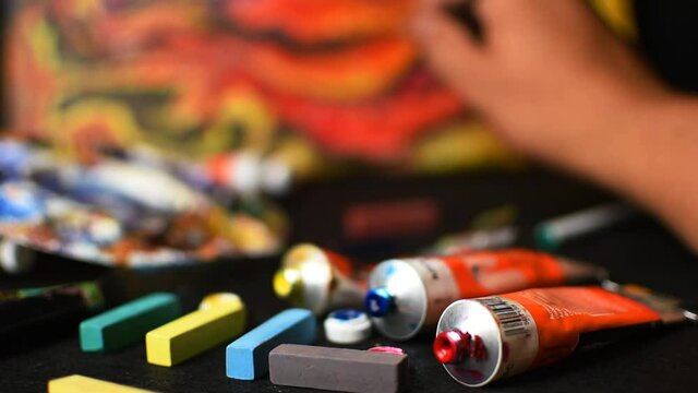 hand painting a picture with art materials-Steady cam