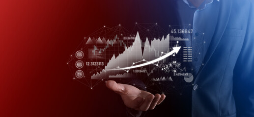 Businessman hold sales data and economic growth graph chart. Business planning and strategy. Analysing trading of exchange. Financial and banking. Technology digital marketing.Profit and growing plan.