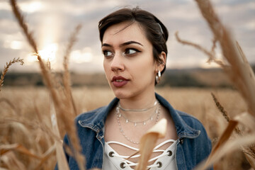 Beautiful young Latin short hair woman outdoors portrait. Fashion concept. Farm plantation.