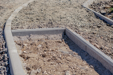 Construction of a new road, sidewalk, storm drainage. Pedestrian walkway and driveway fenced with...