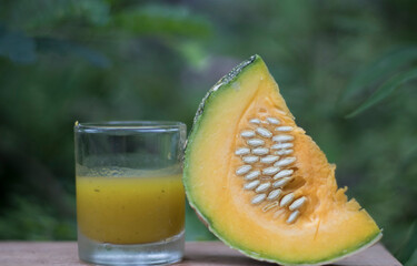 Fresh green pumpkin sliced on the bamboo woven basket. 