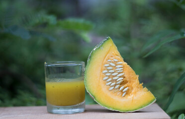 Fresh squash juice isolated on the garden,concept and idea of food countryside style.