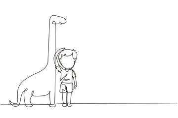 Single continuous line drawing little boy measuring his height with brontosaurus height chart on wall. Kid measures growth. Child measuring height. One line draw graphic design vector illustration © Simple Line