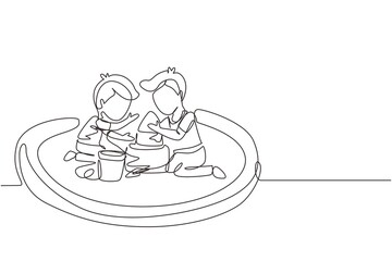 Single continuous line drawing two little boys build sandcastle together. Children sitting on sandbox and playing with sand castle. Brothers or friends having fun. One line draw graphic design vector