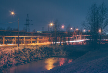 bridge over river among the industrial area 