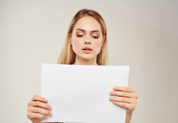 Fototapeta premium pretty woman with a white sheet in hand banner isolated background