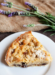 slice of Apple crumble pie with rustic background and rough textures