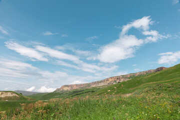 Fototapeta na wymiar Panoramic view of green hills and mountains