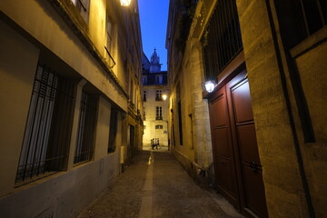 In the street of Paris by night. Summer 2021, Paris, France.