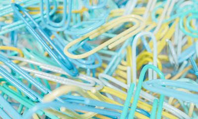 defocused background of paper clips in close up