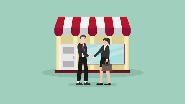 Two young people handshaking in front of the shop