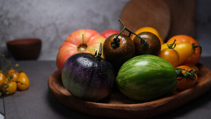 Colourful fresh juicy season tomatoes