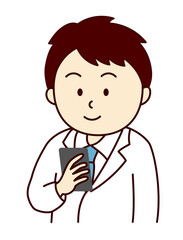 Obraz premium スマホを確認する若い男性医師