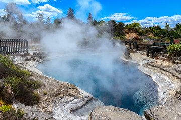 A steaming hot geothermal pool in Whakarewarewa, a tourist attraction in Rotorua, New Zealand