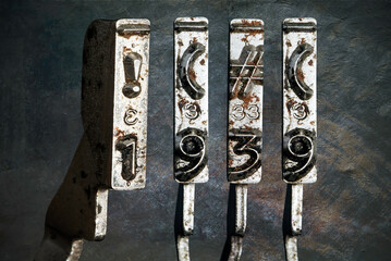 vintage old typewriter hammers with the date 1939  isolated