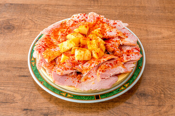 Lacon a la Gallega with potatoes cooked with lots of paprika from La Vera, virgin olive oil and sea salt