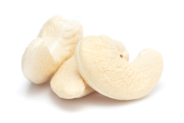 Micro close-up and details of Organic Indian dry fruit cashew nut (Anacardium occidentale) isolated over white background.