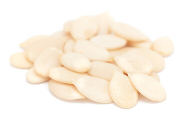 Micro close-up and details of Organic Indian watermelon seed (Citrullus lanatus)  isolated over white background.