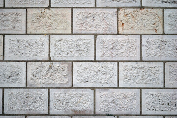 Close Up of Wall with Rough Textured Stone Blocks