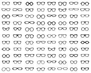 Fototapeta na wymiar Black silhouettes of different eyeglasses on white background