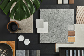 Flat lay of creative architect moodboard composition with samples of building, textile and natural...