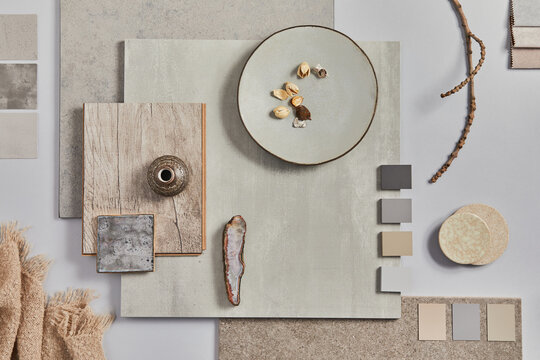 Flat lay of creative architect moodboard composition with samples of building, textile and natural materials and personal accessories. Top view,  white background, template.