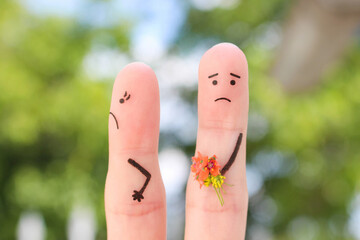 Fingers art of couple. Man gives a woman a bouquet of flowers, she is not satisfied.
