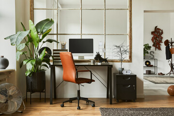 Creative composition of modern masculine home office workspace interior with black industrial desk,...