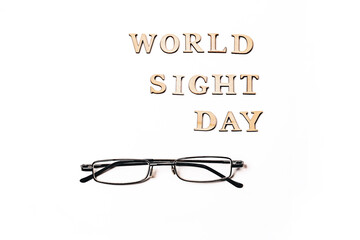 World Sight Day on 10th October. Copy Space. Glasses for improving vision. Flat lay. Top view.