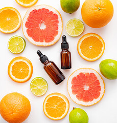 Cosmetic oil and citrus fruits . Cosmetic procedures. Healthy skin. Skin care. Citrus oil. Copy space. Article about care cosmetics