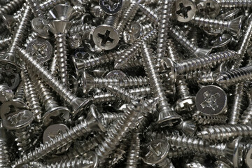 A lot of metal self tapping screws, Texture background