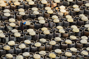 A man at work at a fish sauce factory in Xiapu, China's Fujian province