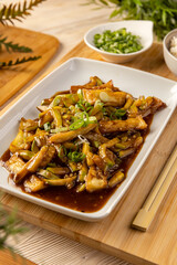 Bamboo shoots and zucchini in spicy sauce