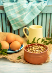 Granola and eggs on rural rustic background, healthy eating, wellbeing, healthy lifestyle, breakfast in the morning