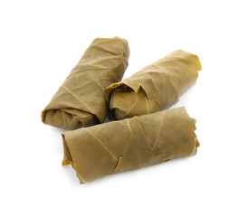 Delicious stuffed grape leaves on white background