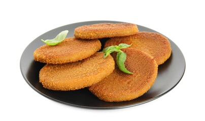 Delicious fried breaded cutlets with basil leaves isolated on white