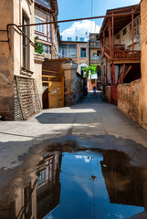 Fototapeta premium street reflection in a puddle