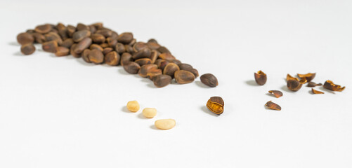 pine nuts on a white background