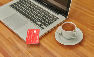 Turkish coffee on the desk, tablet smart phone and laptop style with shopping credit card concept.